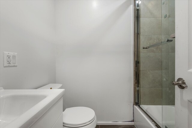 1236 Evergreen Ave, Bronx, NY 10472 - full bath with toilet, combined bath / shower with glass door, and vanity