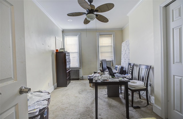 carpeted office space featuring ceiling fan, ornamental molding, baseboards, and radiator