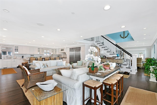 879 Oceanfront, Long Beach, NY 11561 - living room with stairway, dark wood finished floors, ornamental molding, healthy amount of natural light, and recessed lighting
