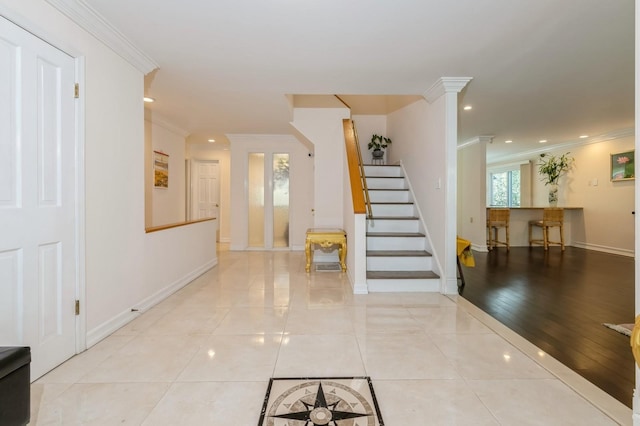 165 Tara Dr, Roslyn, NY 11576 - tiled entryway with crown molding, stairs, recessed lighting, and baseboards