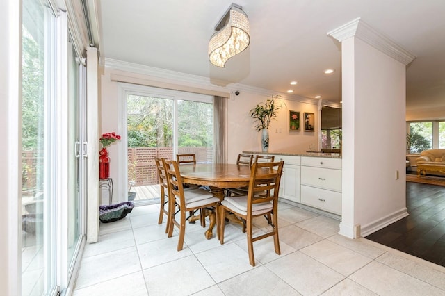 165 Tara Dr, Roslyn, NY 11576 - dining space featuring crown molding, light tile patterned floors, recessed lighting, and baseboards