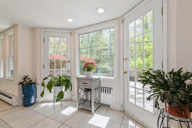 165 Tara Dr, Roslyn, NY 11576 - doorway to outside with baseboard heating, radiator heating unit, tile patterned flooring, healthy amount of natural light, and recessed lighting