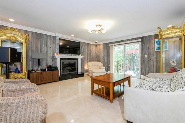 165 Tara Dr, Roslyn, NY 11576 - tiled living area with crown molding, a baseboard heating unit, a fireplace, and wood walls