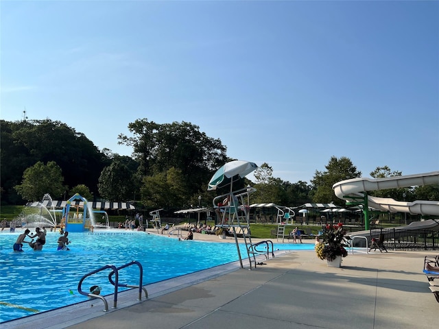 165 Tara Dr, Roslyn, NY 11576 - community pool with fence and a patio area