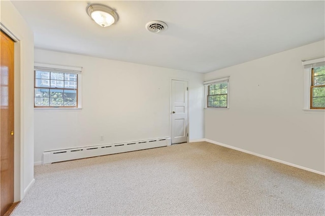 51 Strong Rd, Ferndale, NY 12734 - carpeted spare room with visible vents, baseboards, and a baseboard heating unit