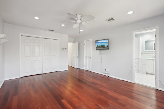 unfurnished bedroom featuring recessed lighting, visible vents, and wood finished floors