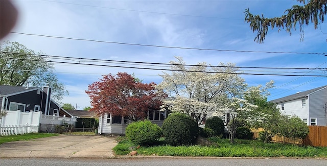 obstructed view of property with fence