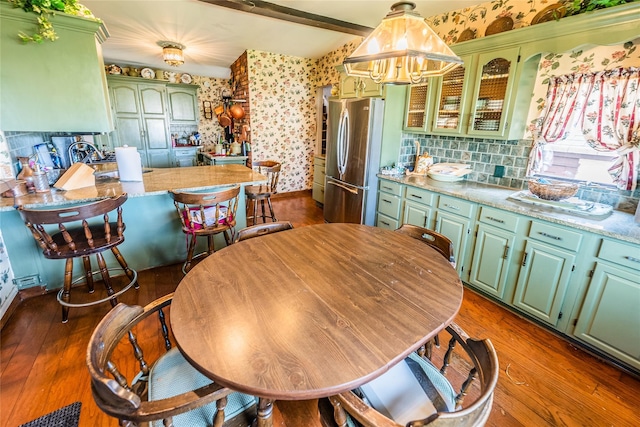 14-35 161st St, Beechhurst, NY 11357 - kitchen with wallpapered walls, green cabinets, and freestanding refrigerator