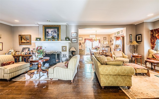 14-35 161st St, Beechhurst, NY 11357 - living room featuring recessed lighting, an inviting chandelier, a fireplace, wood-type flooring, and crown molding