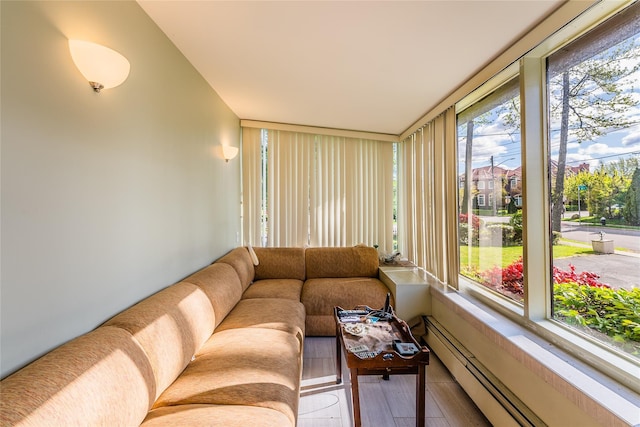 14-35 161st St, Beechhurst, NY 11357 - living area featuring baseboard heating and wood finished floors