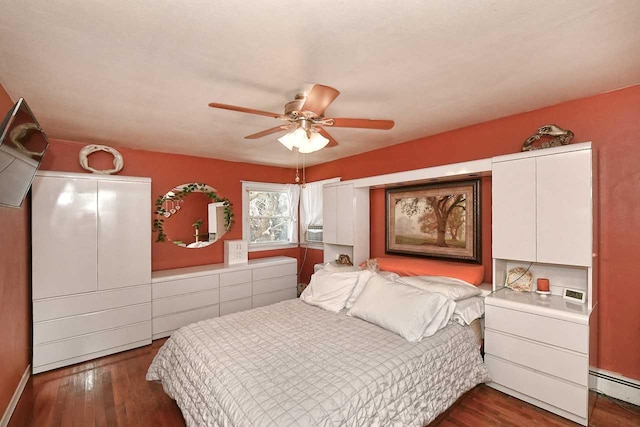 bedroom featuring a baseboard radiator, cooling unit, ceiling fan, and dark wood-type flooring