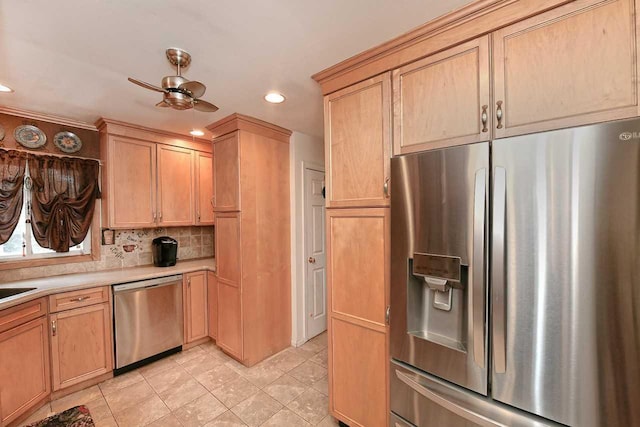 kitchen featuring light countertops, appliances with stainless steel finishes, light tile patterned floors, and recessed lighting