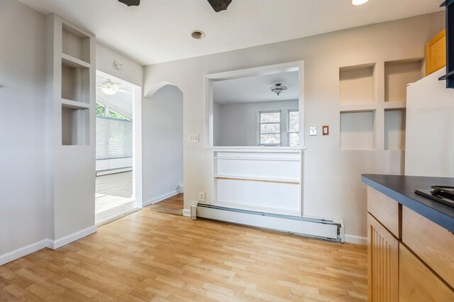 159 S Harrison Ave, Congers, NY 10920 - kitchen featuring a baseboard heating unit, baseboard heating, healthy amount of natural light, light wood-style flooring, and recessed lighting