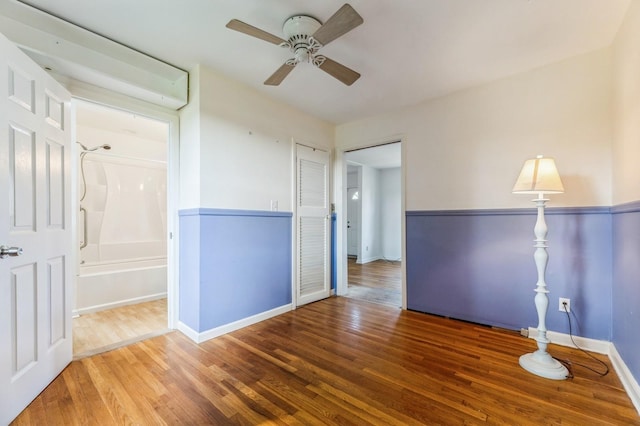 159 S Harrison Ave, Congers, NY 10920 - empty room with wood finished floors, a ceiling fan, and baseboards