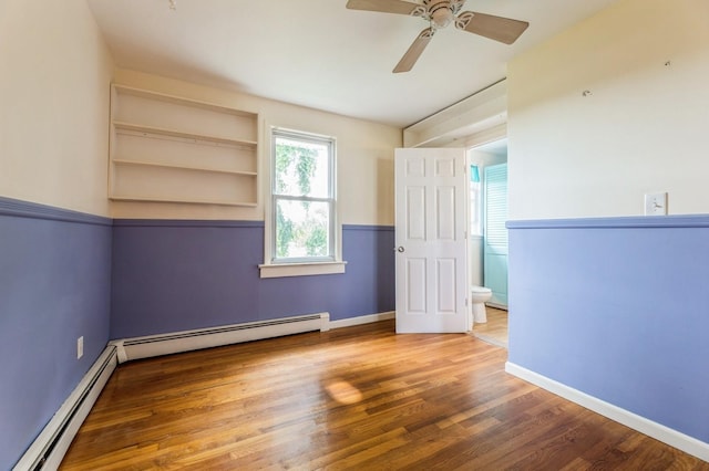 159 S Harrison Ave, Congers, NY 10920 - unfurnished room featuring baseboard heating, ceiling fan, wood finished floors, and baseboards
