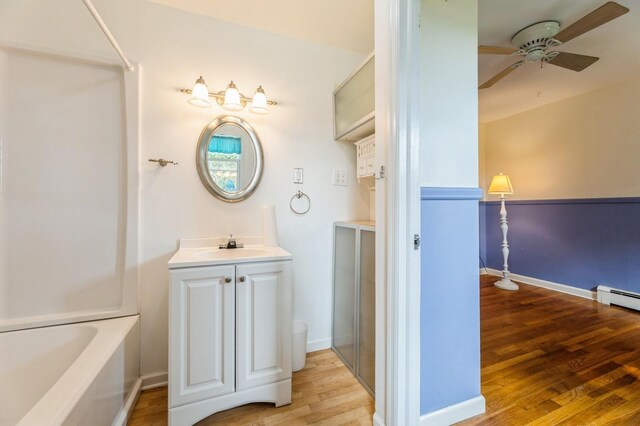 159 S Harrison Ave, Congers, NY 10920 - full bath with ceiling fan, wood finished floors, vanity, and baseboards
