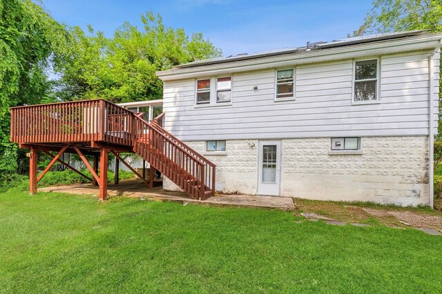 159 S Harrison Ave, Congers, NY 10920 - rear view of property featuring a yard, a deck, and stairway