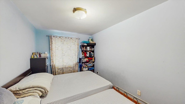 143-36 37th Ave Unit 5C, Flushing, NY 11354 - bedroom with baseboards