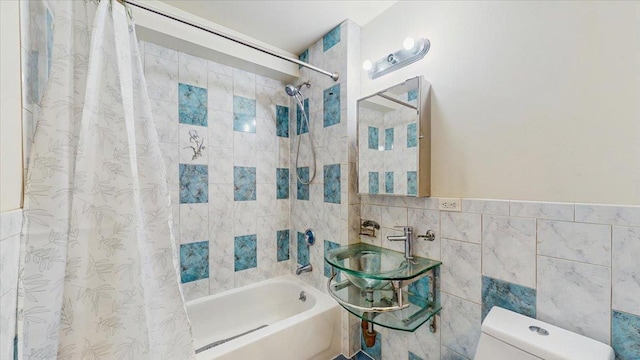 143-36 37th Ave Unit 5C, Flushing, NY 11354 - bathroom with tile walls, shower / tub combo, toilet, and a sink