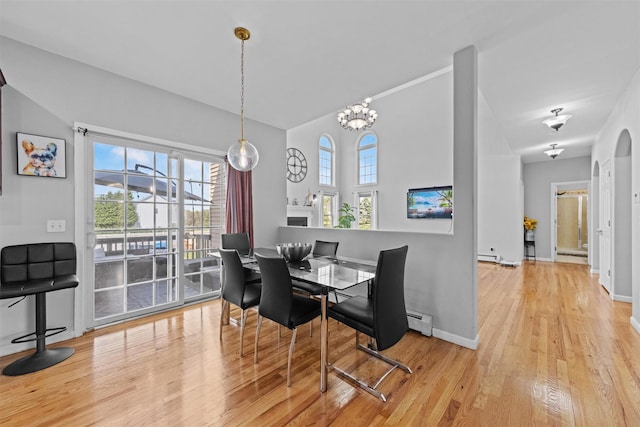 3 Kings Dr, Middletown, NY 10941 - dining room with wood finished floors, baseboard heating, and baseboards