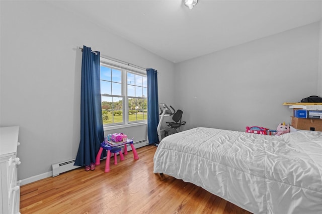 3 Kings Dr, Middletown, NY 10941 - bedroom with light wood-style floors, a baseboard radiator, and baseboards
