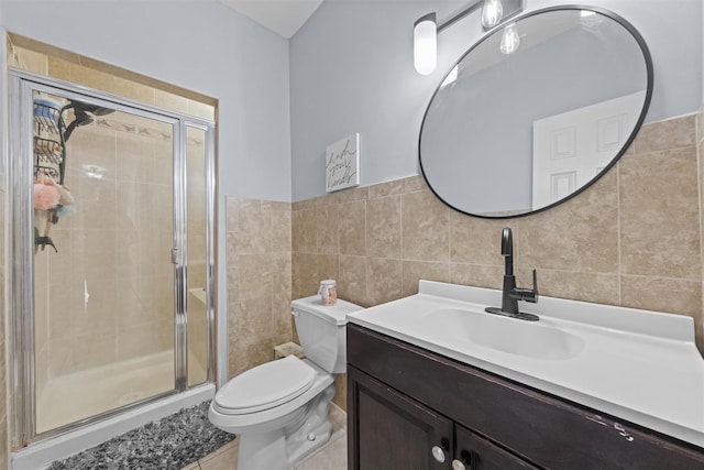 3 Kings Dr, Middletown, NY 10941 - bathroom with tile walls, a shower stall, toilet, and vanity