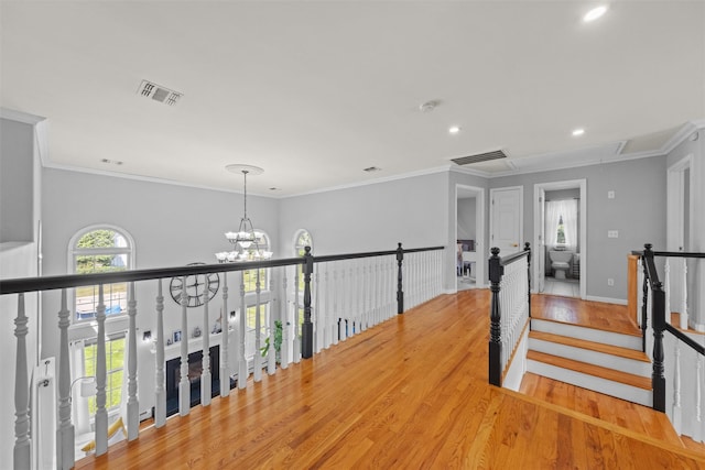 3 Kings Dr, Middletown, NY 10941 - corridor with attic access, wood finished floors, recessed lighting, a chandelier, and crown molding