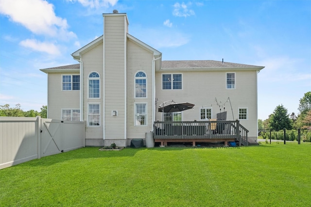 3 Kings Dr, Middletown, NY 10941 - rear view of property featuring a gate, a deck, and a chimney