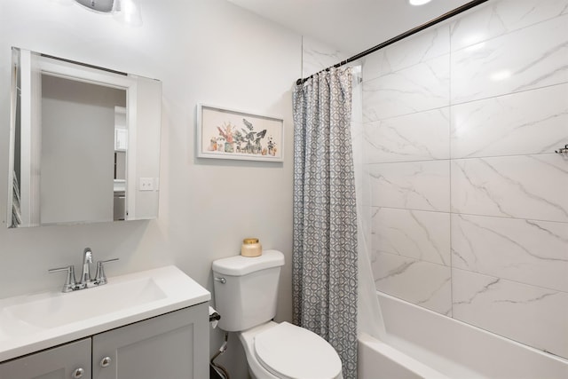 bathroom featuring toilet, shower / tub combo, and vanity