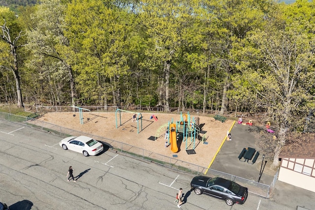 aerial view featuring a wooded view