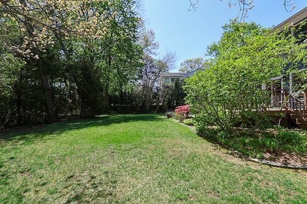 view of yard with a deck