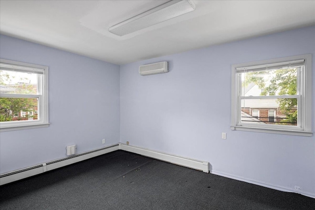 carpeted empty room with a wall mounted AC, plenty of natural light, and a baseboard heating unit