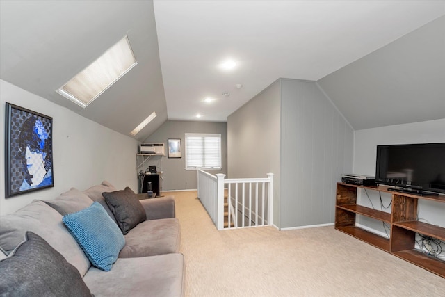 carpeted living area with vaulted ceiling