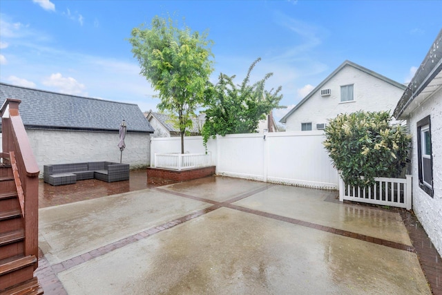 view of patio featuring a fenced backyard and an outdoor hangout area