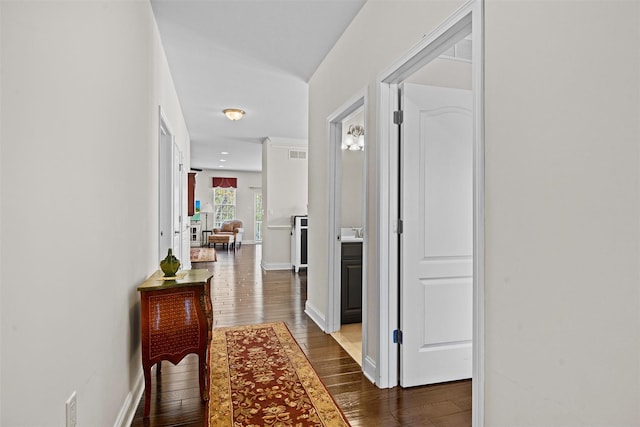 13 Sage Ct, Middletown, NY 10940 - hall featuring visible vents, dark wood-style flooring, and baseboards