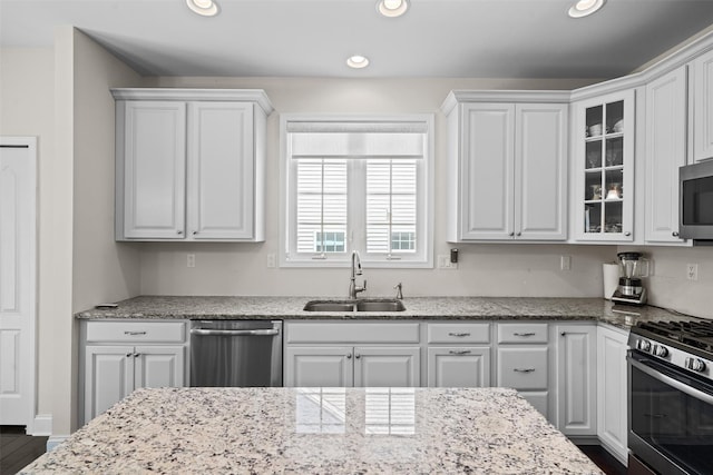 13 Sage Ct, Middletown, NY 10940 - kitchen with glass insert cabinets, recessed lighting, white cabinetry, a sink, and stainless steel appliances