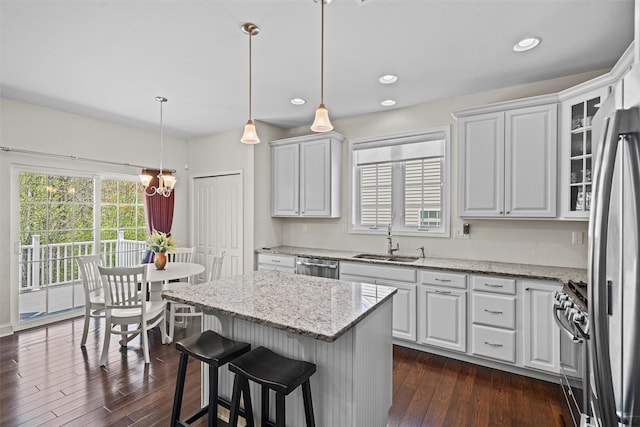 13 Sage Ct, Middletown, NY 10940 - kitchen with a sink, white cabinets, stainless steel appliances, and dark wood finished floors