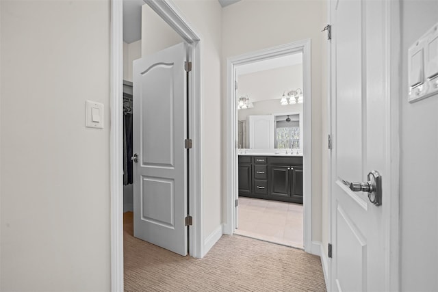 13 Sage Ct, Middletown, NY 10940 - hall with baseboards and light carpet