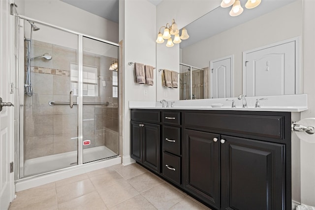 13 Sage Ct, Middletown, NY 10940 - bathroom featuring double vanity, a sink, tile patterned flooring, and a stall shower