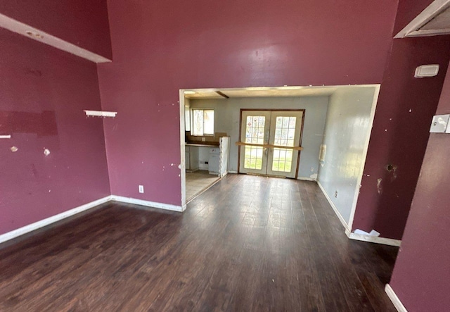 73 4th St, Brentwood, NY 11717 - interior space with baseboards, french doors, and wood finished floors
