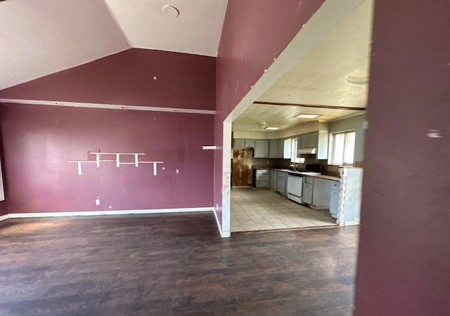 73 4th St, Brentwood, NY 11717 - interior space featuring light wood-type flooring, baseboards, and lofted ceiling