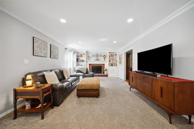 living room with crown molding, a brick fireplace, recessed lighting, and light colored carpet