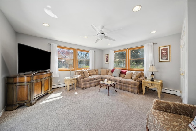 carpeted living room with recessed lighting, ceiling fan, and a baseboard radiator