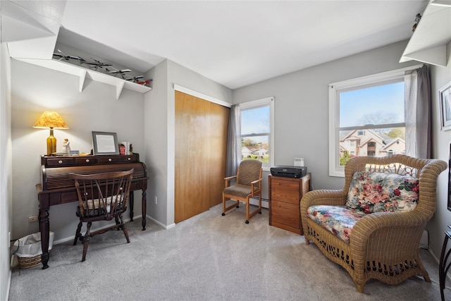 carpeted office featuring baseboards and baseboard heating