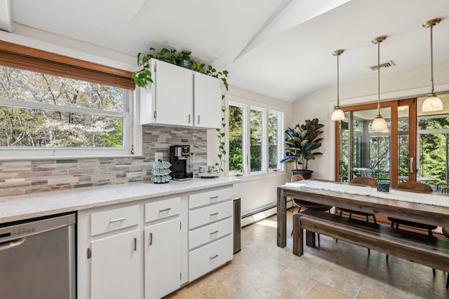 kitchen with tasteful backsplash, visible vents, dishwasher, and vaulted ceiling