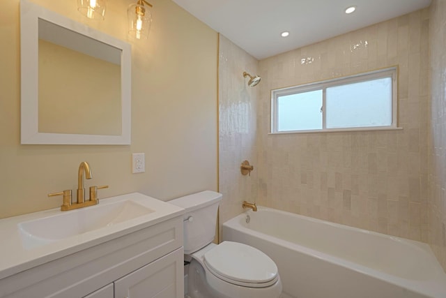 bathroom with toilet, bathing tub / shower combination, vanity, and recessed lighting