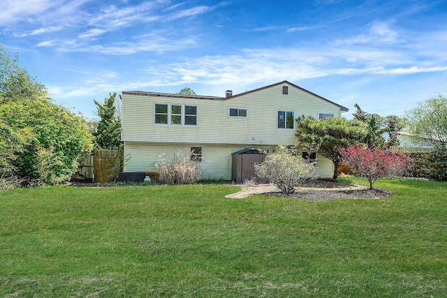 rear view of house with cooling unit