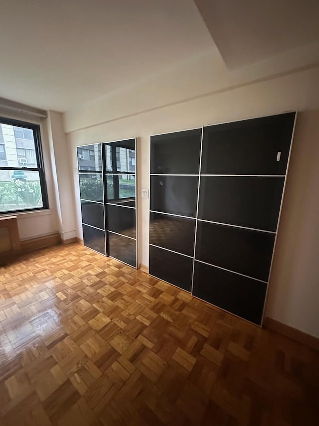 98-22 63rd Dr Unit 1E, Rego Park, NY 11374 - interior space with baseboards and a wealth of natural light