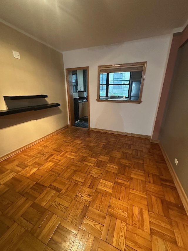 98-22 63rd Dr Unit 1E, Rego Park, NY 11374 - unfurnished room featuring baseboards
