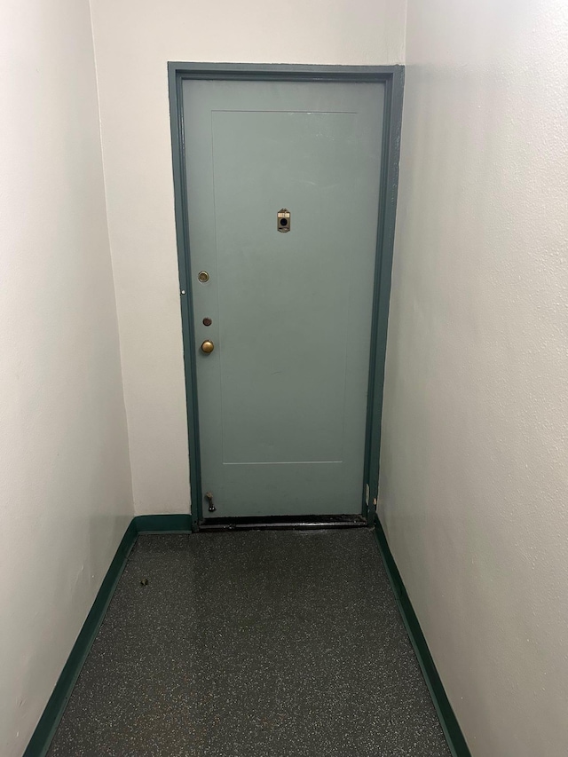 98-22 63rd Dr Unit 1E, Rego Park, NY 11374 - doorway to outside featuring baseboards